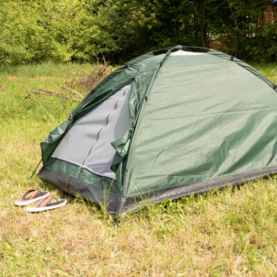 Green tent in the garden for camping